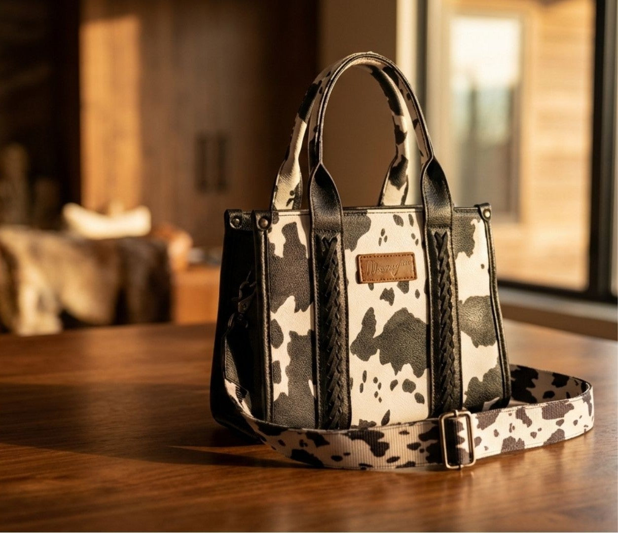 Cow Print Wrangler Purse | Western wear for the modern woman | The Rooster Den Co